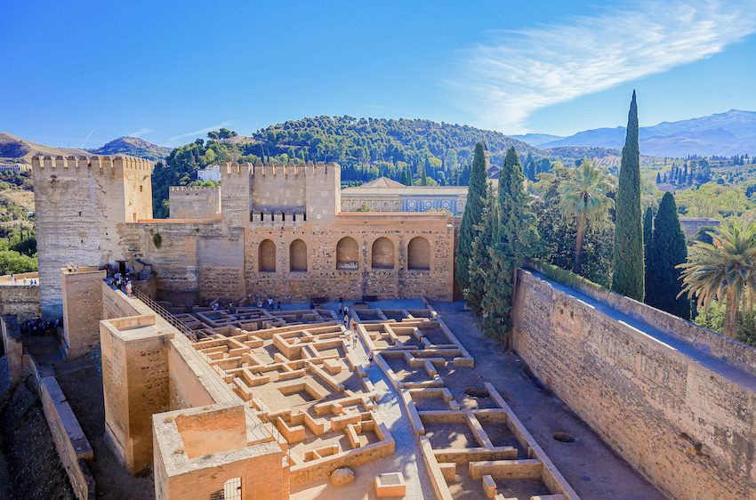 Reddish walls of the Alcazaba fortress at the Alhambra in Granada, Spain.