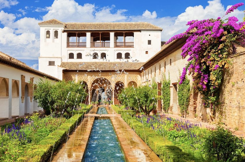 Court of the Water Channel (Patio de la Acequia) at the Generalife Palace in the Alhambra, Granada, Spain.
