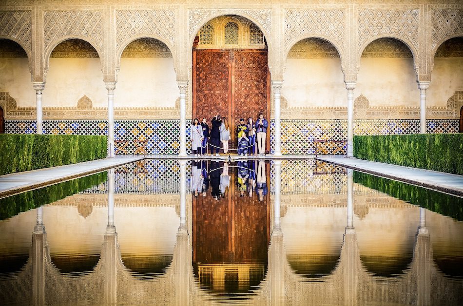 Central water basin in the Court of the Myrtles (Patio de los Arrayanes), Palace of Comares, Alhambra, Granada, Spain.