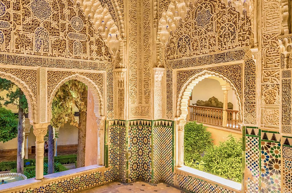 Intricate Arabic calligraphic inscriptions decorating the Lindaraja Viewpoint (Mirador de Lindaraja) in the Palace of the Lions at the Alhambra, Granada.